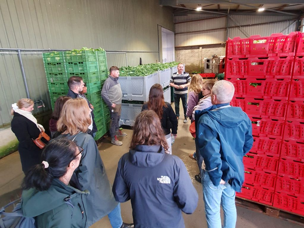 Image of Willi Andree explaining the postharvest washing process