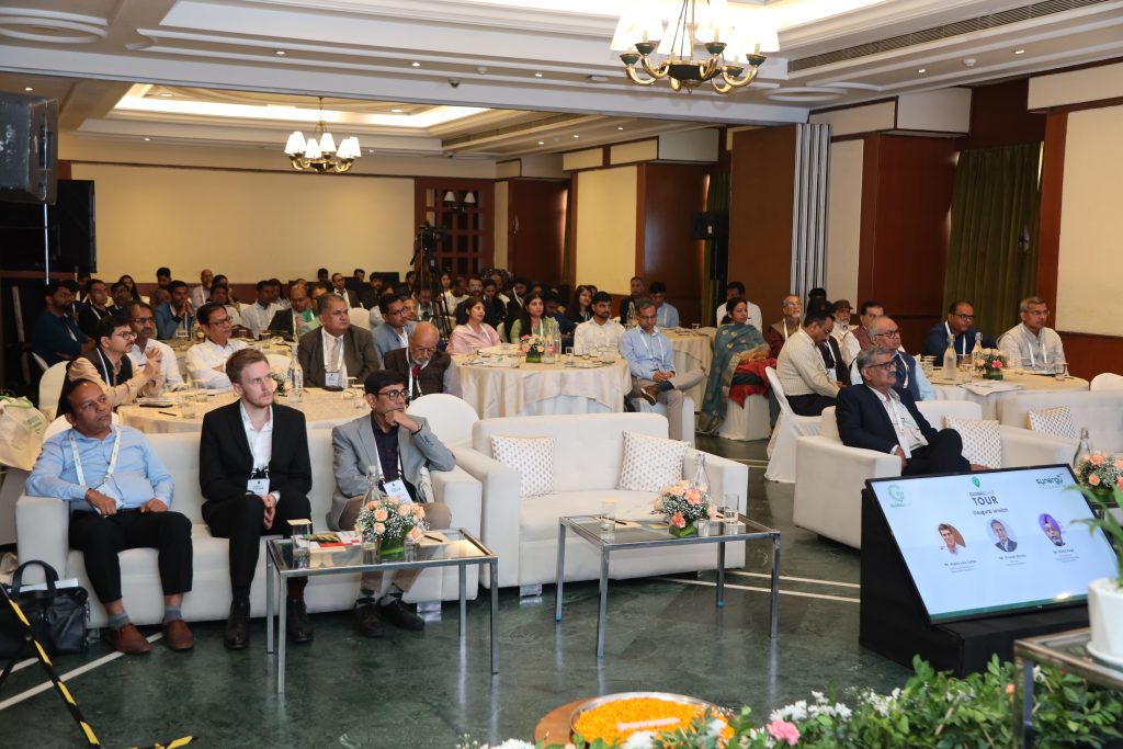 Participants of the TOUR stop India sitting in a conference room