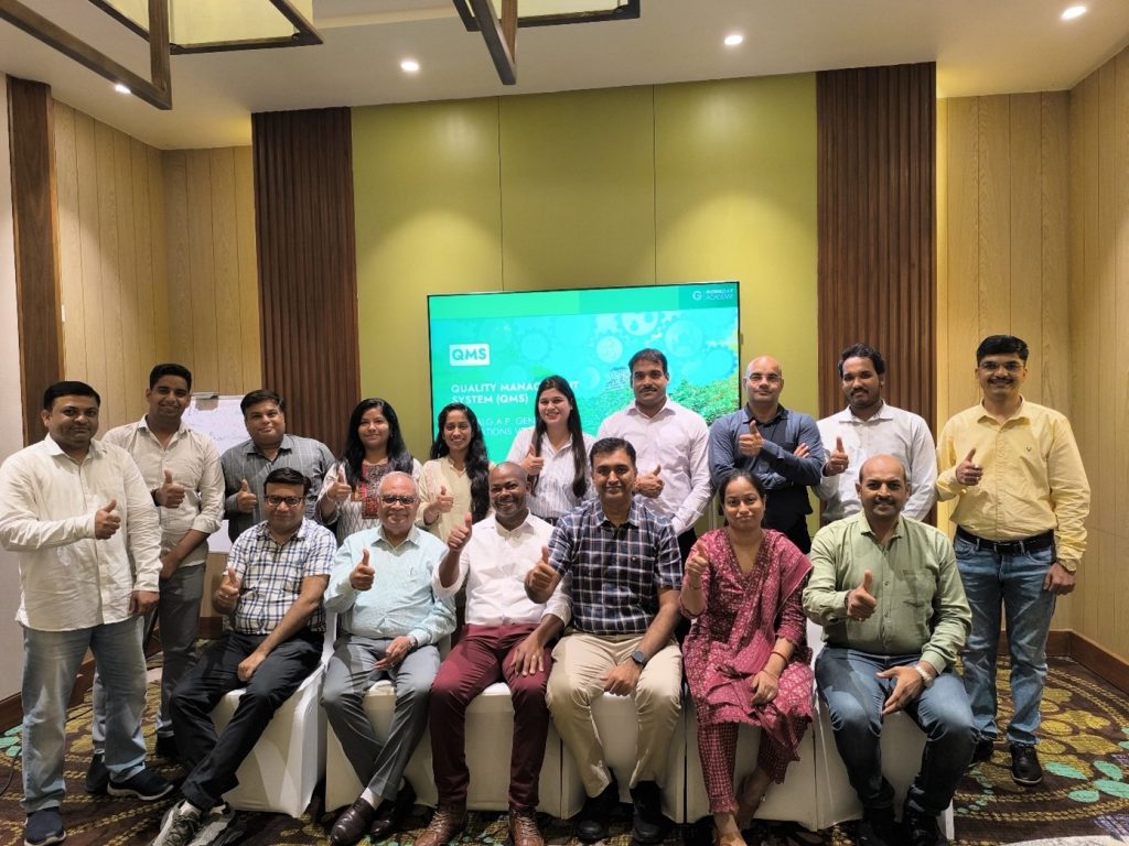 Group photo of participants from the training sessions in India