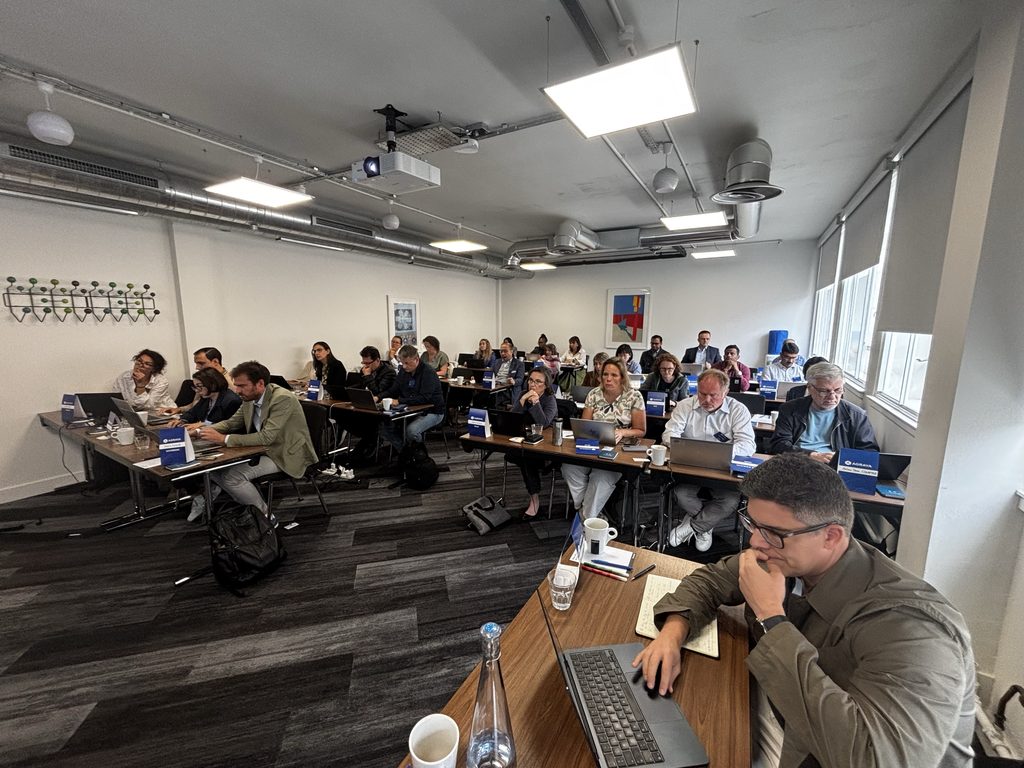 Participants of the meeting in a conference room