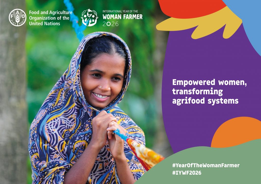 A UN International Year of the Woman Farmer poster of a woman smiling